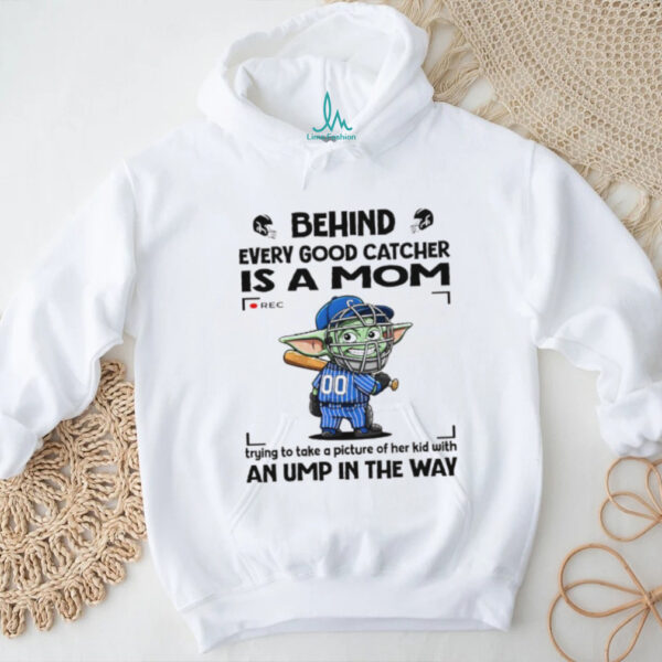 Baby Yoda behind every good catcher is a mom trying to take a picture of her shirt