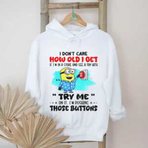 Minion red button I don’t care how old I get if I’m in a and see a toy with me try me on it I’m pushing the buttons shirt