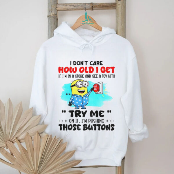 Minion red button I don’t care how old I get if I’m in a and see a toy with me try me on it I’m pushing the buttons shirt