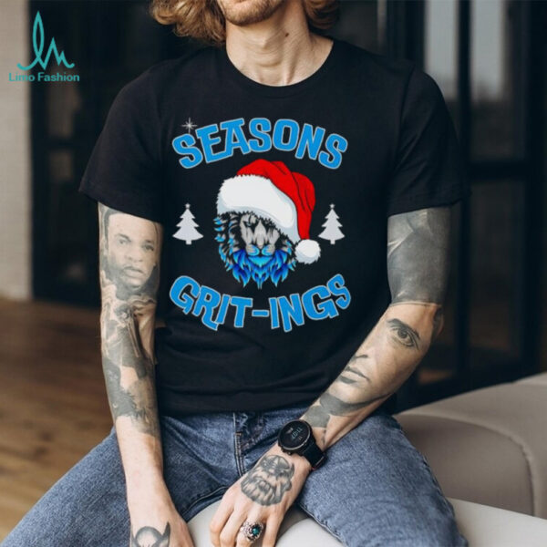 Seasons Grit ings blue fur lion wearing Santa hat Christmas trees shirt
