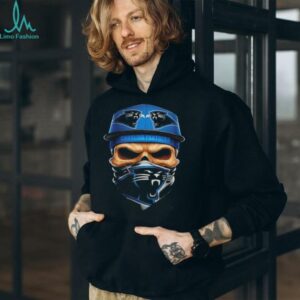 Skull wearing a face scarf Carolina Panthers football shirt