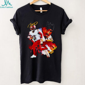 Washington Commanders football player running with the ball shirt