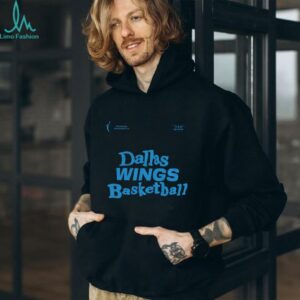 Paige Bueckers wearing Dallas Wings basketball shirt