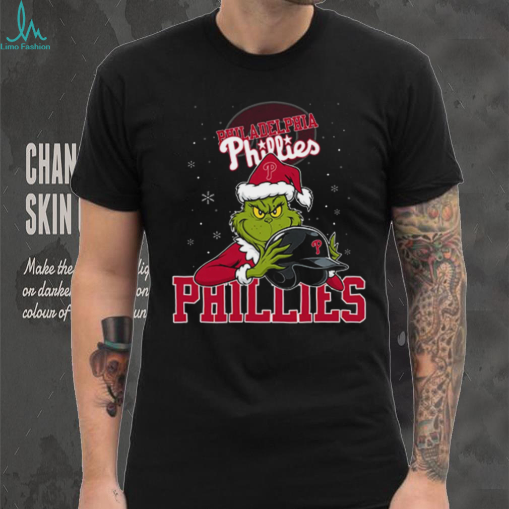 MLB Philadelphia Phillies Christmas Grinch Helmets Baseball Logo T Shirt MLB Philadelphia Phillies Christmas Grinch Helmets Baseball Logo T Shirt
