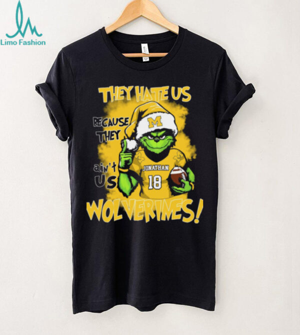 Michigan Wolverines Custom Name Grinch Holiday Tee – NCAA Football Christmas Shirt – “They Hate Us Because They Ain’t Us” Gift for Fans