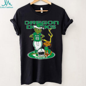 Oregon Ducks Custom Name Grinch with Dog Christmas Shirt – NCAA Football Tee – Personalized Holiday Gift for Fans & Supporters