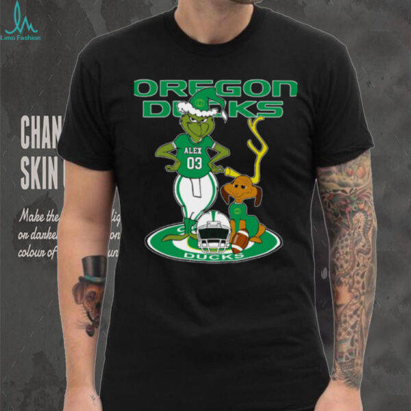 Oregon Ducks Custom Name Grinch with Dog Christmas Shirt – NCAA Football Tee – Personalized Holiday Gift for Fans & Supporters