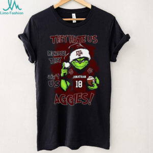 Texas A&M Aggies Custom Name Grinch Christmas Shirt – Personalized NCAA Football Tee – Quote Holiday Gift “They Hate Us Because They Ain’t Us”