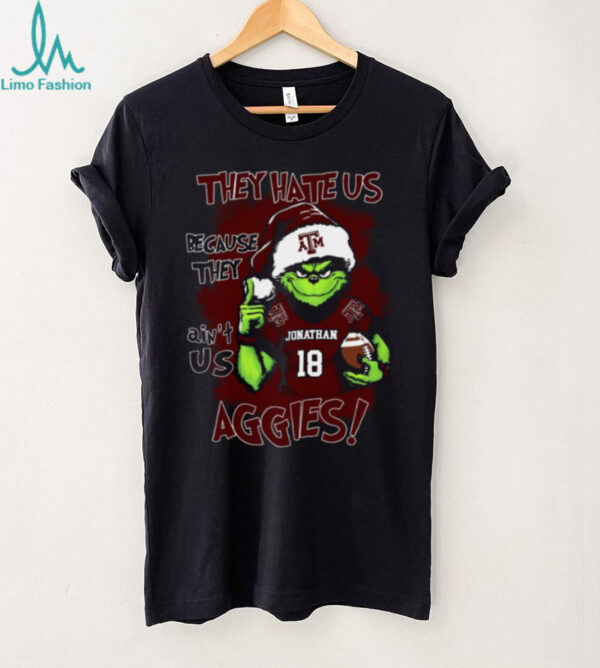Texas A&M Aggies Custom Name Grinch Christmas Shirt – Personalized NCAA Football Tee – Quote Holiday Gift “They Hate Us Because They Ain’t Us”