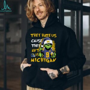 The Grinch Santa Hat They Hate Us Because Ain’t Us Michigan Football Christmas Shirt