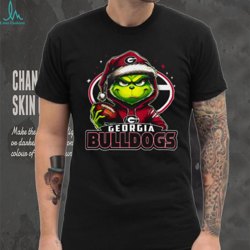 Georgia Bulldogs Grinch Holding Football Christmas Shirts Georgia Bulldogs Grinch Holding Football Christmas Shirts