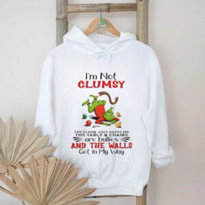 Grinch I’m not clumsy the floor just hates me the table and chairs are bullies Christmas shirt