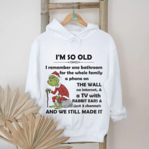 Grinch Santa hat I’m so old I remember one bathroom for the whole family a phone on the wall Christmas shirt
