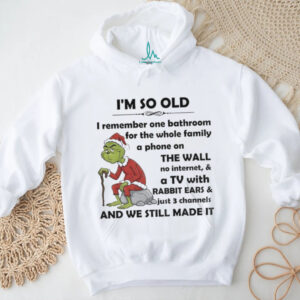 Grinch Santa hat I’m so old I remember one bathroom for the whole family a phone on the wall Christmas shirt