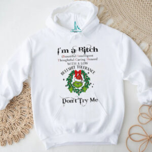 Grinch big face middle finger Santa hat I’m a bitch beautiful intelligent thoughtful caring honest with a low Christmas shirt