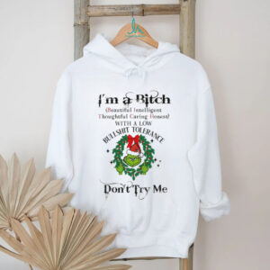 Grinch big face middle finger Santa hat I’m a bitch beautiful intelligent thoughtful caring honest with a low Christmas shirt
