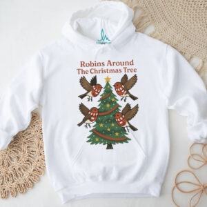 Mark Robins around the Christmas tree shirt