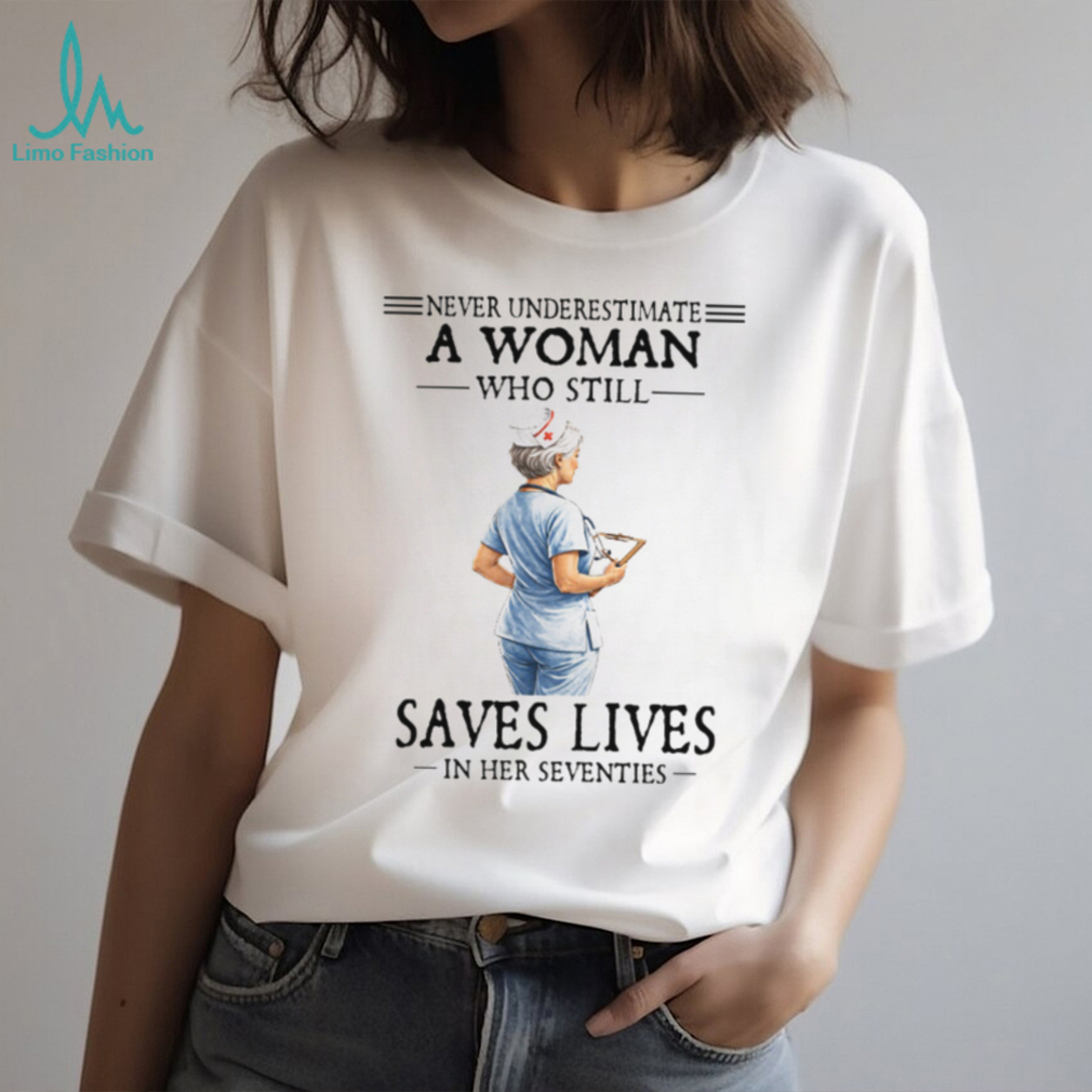 Never Underestimate A Woman Who Still Saves Lives Seventies Nurse Tee Never Underestimate A Woman Who Still Saves Lives Seventies Nurse Tee