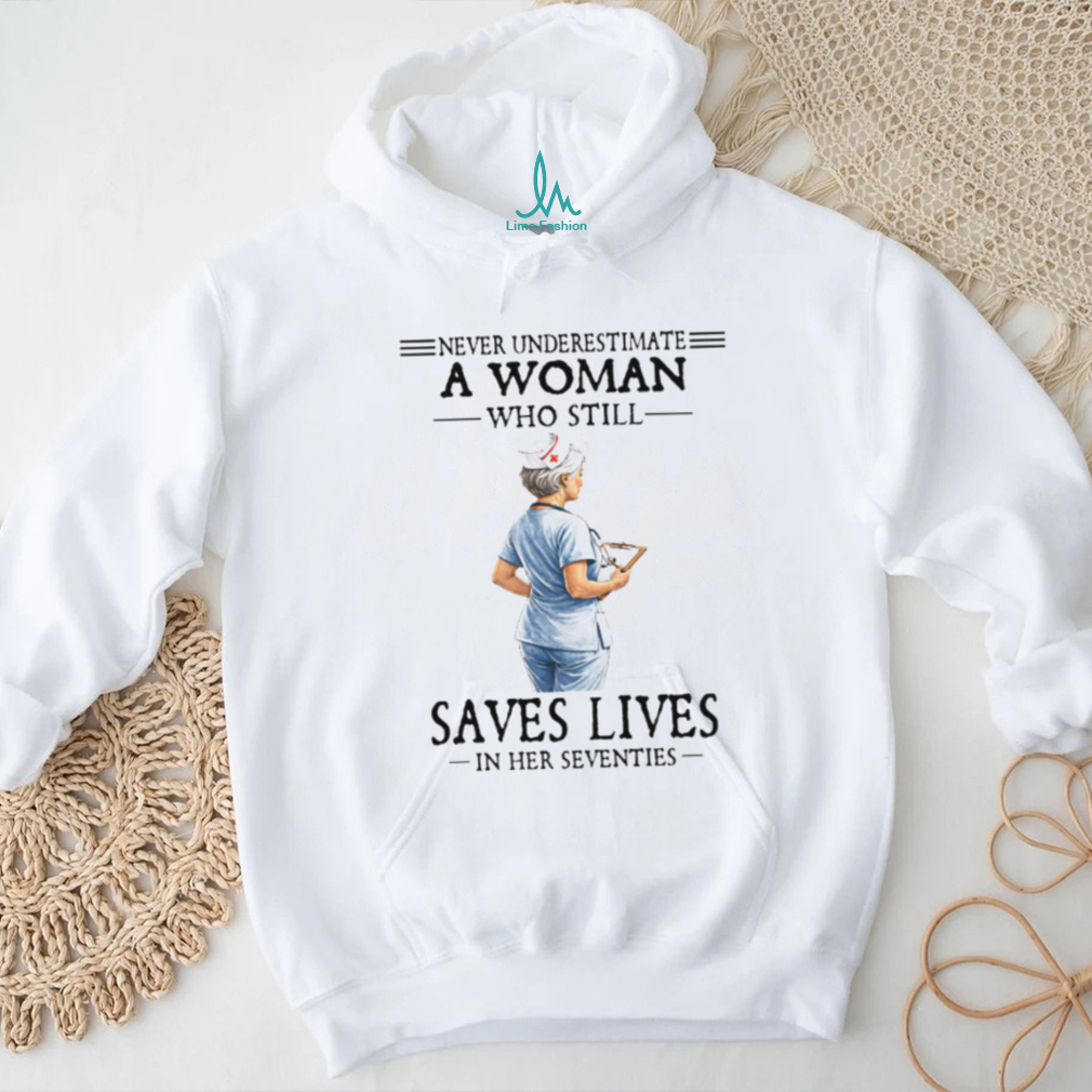 Never Underestimate A Woman Who Still Saves Lives Seventies Nurse Tee Never Underestimate A Woman Who Still Saves Lives Seventies Nurse Tee