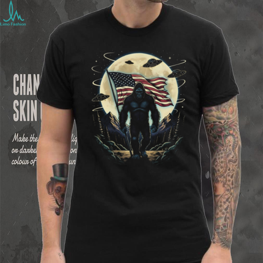 Patriotic Bigfoot American Flag T Shirt Sasquatch & UFO Moon Graphic Tee Patriotic Bigfoot American Flag T Shirt Sasquatch & UFO Moon Graphic Tee