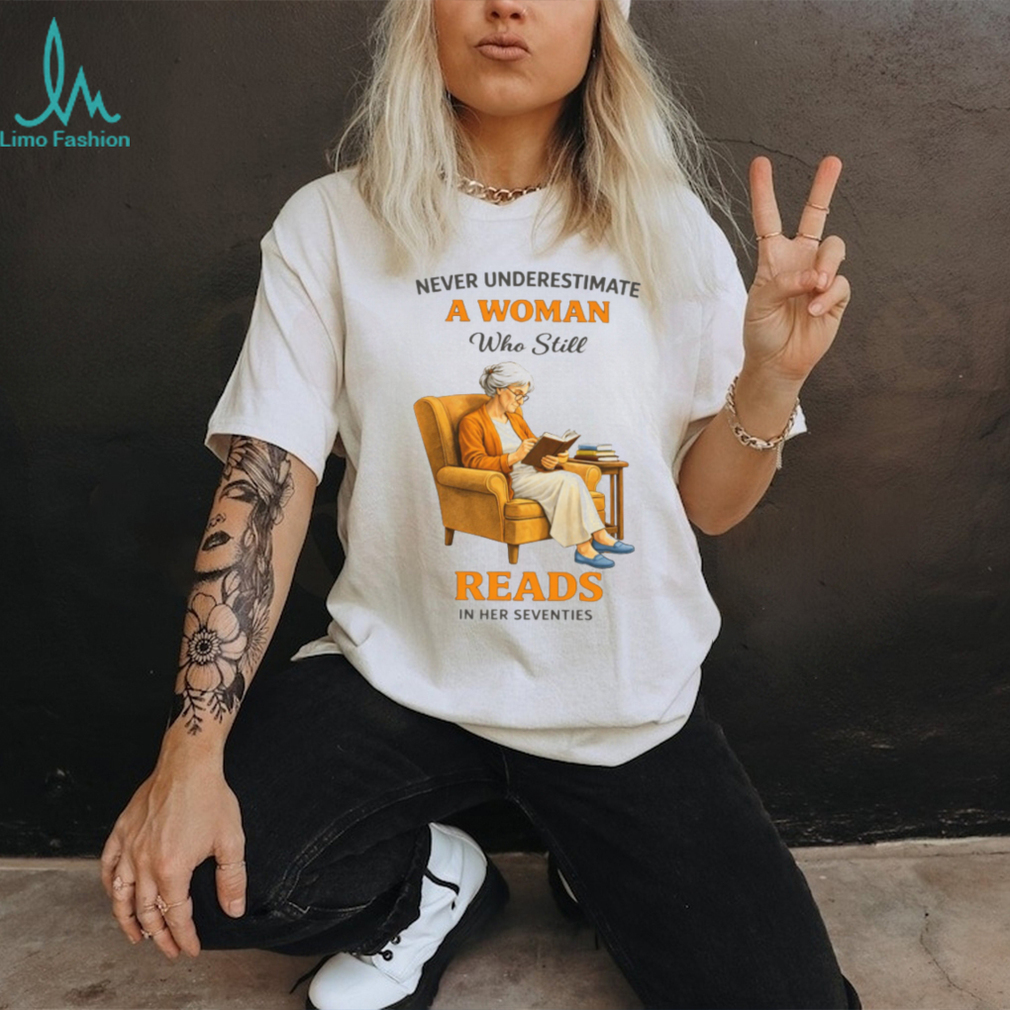 Never Underestimate A Woman Who Still Reads In Her Seventies Graphic T shirt Never Underestimate A Woman Who Still Reads In Her Seventies Graphic T shirt