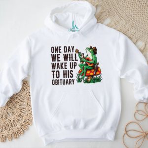 One day we will wake up to his obituary cartoon frog shirt