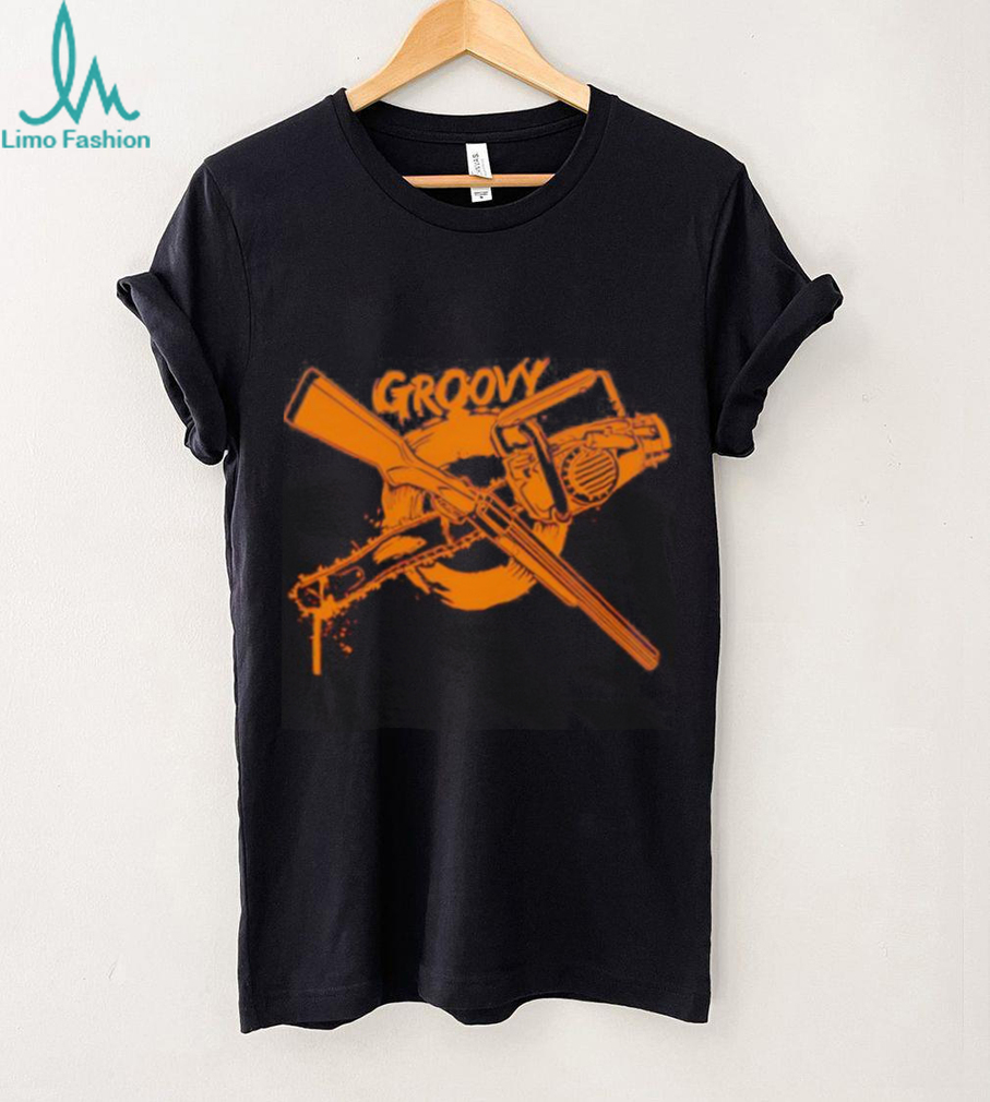 Groovy Chainsaw and Boomstick Shotgun shirt