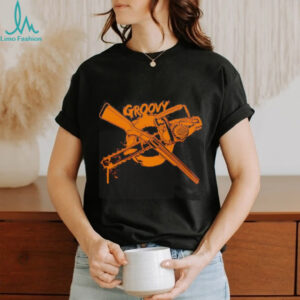 Groovy Chainsaw and Boomstick Shotgun shirt