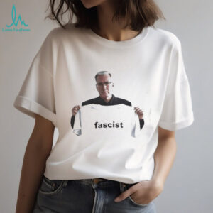 Keith Olbermann holding up fascist shirt