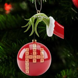 personalized Christmas ornament featuring a red bauble with a Scrabble style crossword puzzle of family names