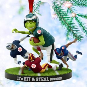 personalized Christmas ornament featuring the Grinch playing American football against other players personalized Christmas ornament featuring the Grinch playing American football against other players