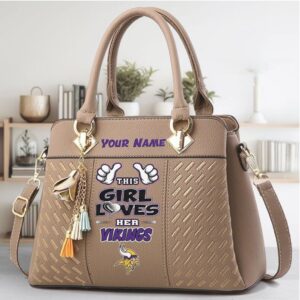 NFL Minnesota Vikings Women's Top Handle Shoulder Bag with Tassel Charm