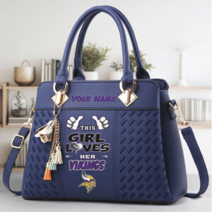 NFL Minnesota Vikings Women's Top Handle Shoulder Bag with Tassel Charm