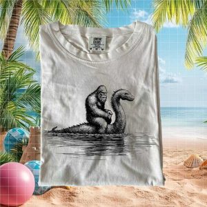 Bigfoot Riding Loch Ness Monster Cryptid Humor Graphic T Shirt