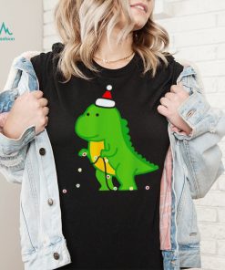 Dinosaur putting up string lights Christmas shirt