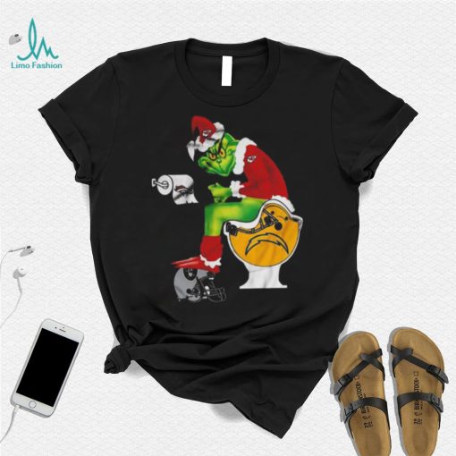 Kansas City Chiefs Grinch Sitting On San Diego Chargers Toilet And Step On Oakland Raiders Helmet 2022 Shirt