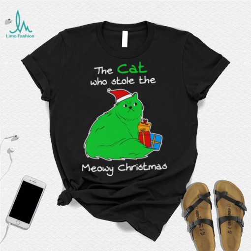 The cat who stole the Meowy Christmas shirt