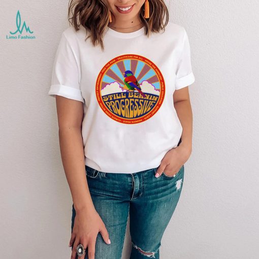 Dawn still Bernin rainbow colored bird with political goals logo shirt1