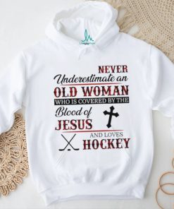 Never underestimate an old woman who is covered by the blood of jesus and loves hockey shirt