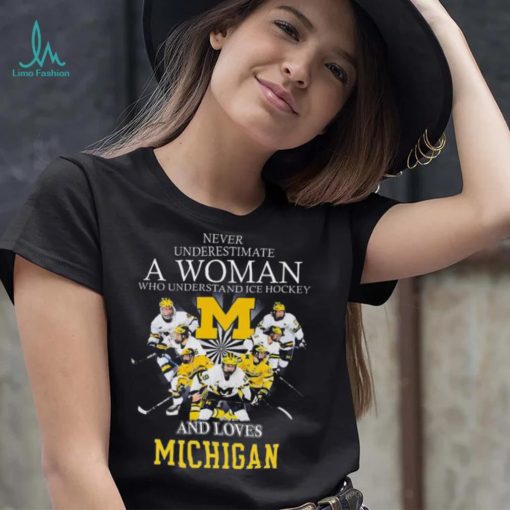 Michigan wolverines never underestimate a woman who understands ice hockey and loves michigan wolverines 2023 shirt