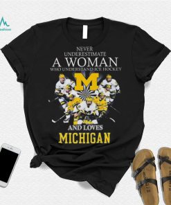 Never underestimate a woman who understands ice hockey and loves michigan wolverines shirt