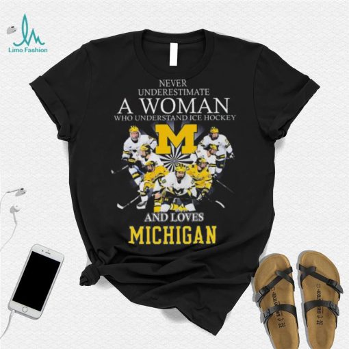 Never underestimate a woman who understands ice hockey and loves michigan wolverines shirt