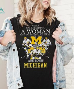 Never underestimate a woman who understands ice hockey and loves michigan wolverines shirt