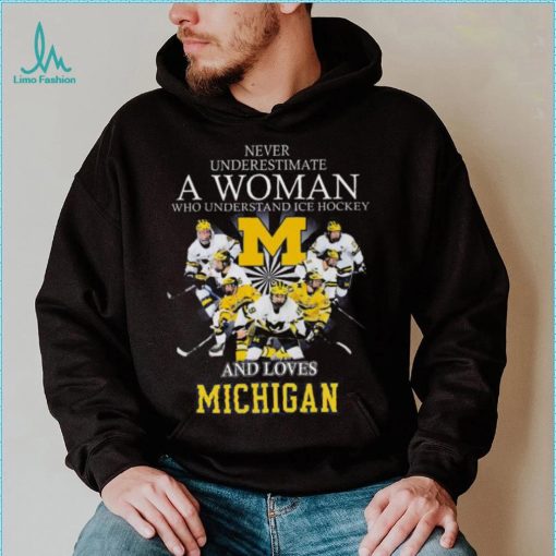 Never underestimate a woman who understands ice hockey and loves michigan wolverines shirt