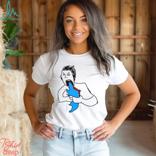 Elon devouring his Twitter new shirt