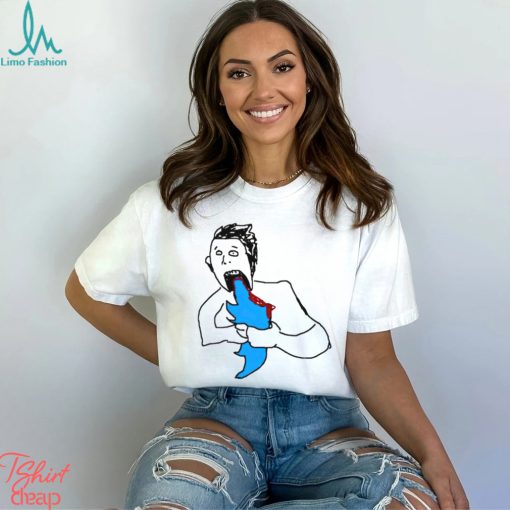 Elon devouring his Twitter new shirt