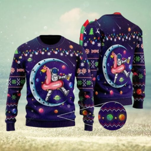 Party Astronauts Sit On Flamingo Floats At A Space Ugly Christmas Sweater Party