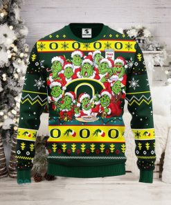 Christmas Gift NCAA Oregon Ducks Cute 12 Grinch Face Xmas Day Men And Women Ugly Christmas Sweater