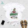 Funny the grinch hand rolling up some Christmas shirt