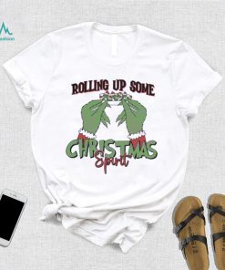Funny the grinch hand rolling up some Christmas shirt